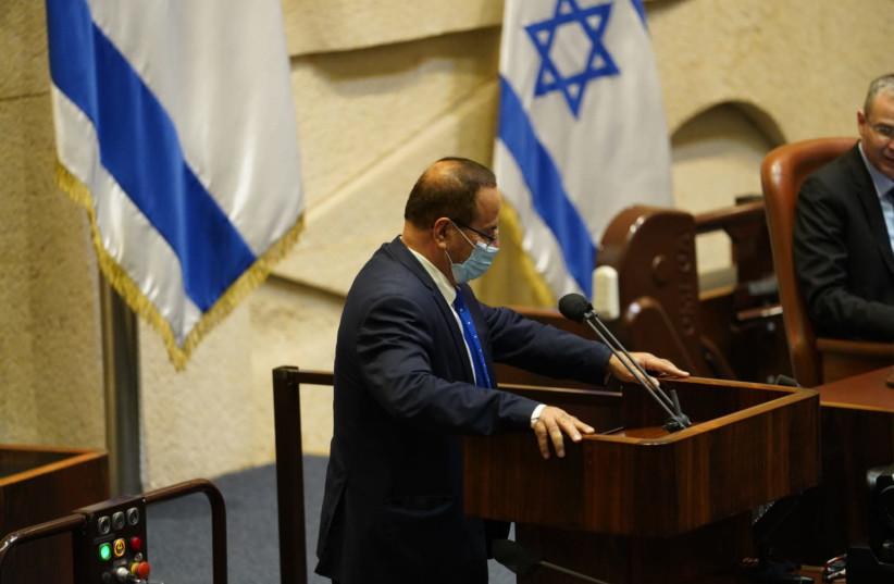 New Likud MK Ayoub Kara is sworn in, Knesset plenum, December 28, 2020 (photo credit: KNESSET SPOKESPERSON/DANI SHEM TOV)