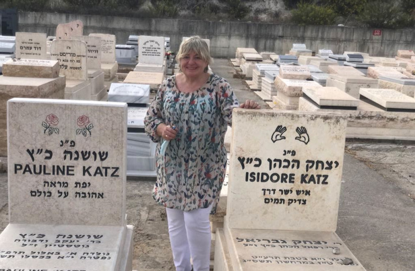 Prof. Ruth Katz is seen at her parents' graves in Beit Shemesh. (photo credit: Courtesy)