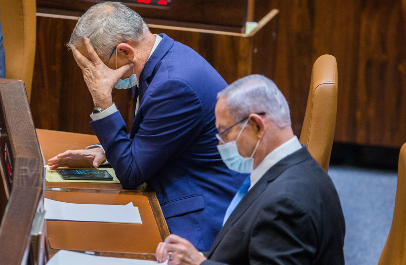Alternate Prime Minister and Minister of Defense Benny Gantz and Israeli Prime Minister Benjamin Netanyahu seen during a vote at the Knesset, the Israeli parliament in Jerusalem on August 24, 2020. (photo credit: OREN BEN HAKOON/FLASH90)