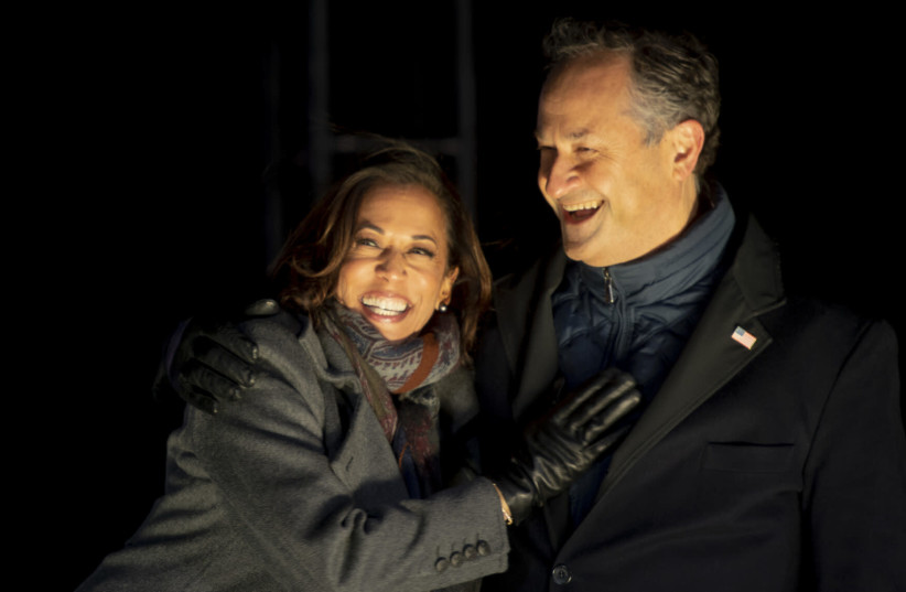 Kamala Harris made history as both the first woman and the first woman of color to be elected vice president, and her husband, Doug Emhoff, made history as the first Jewish “second husband.” (photo credit: MARK MAKELA/GETTY IMAGES)