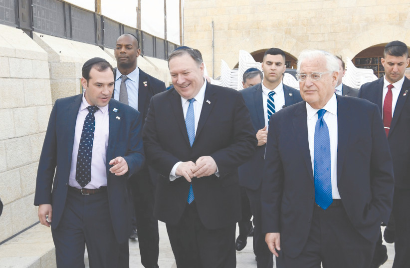 ARYEH LIGHTSTONE (left) accompanies Secretary of State Mike Pompeo and US Ambassador to Israel David Friedman on a visit to the Western Wall  in 2019. (photo credit: MATTY STERN/US EMBASSY JERUSALEM)