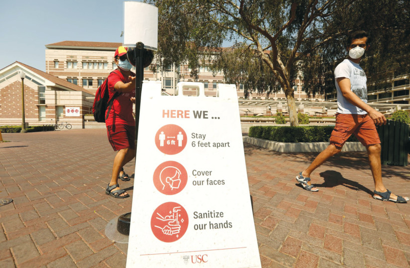A SIGN ON the campus of the University of Southern California at the beginning of the fall semester (photo credit: GENARO MOLINA/LOS ANGELES TIMES/TNS)