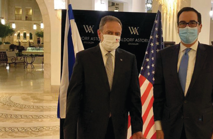 Jerusalem's Waldorf Astoria General Manager Avner On (left) with US Secretary of the Treasury Steve Mnuchin (photo credit: WALDORF ASTORIA JERUSALEM)