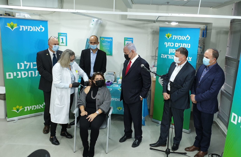 Israel inoculates its two millionth citizen with a coronavirus vaccine. (photo credit: Courtesy)