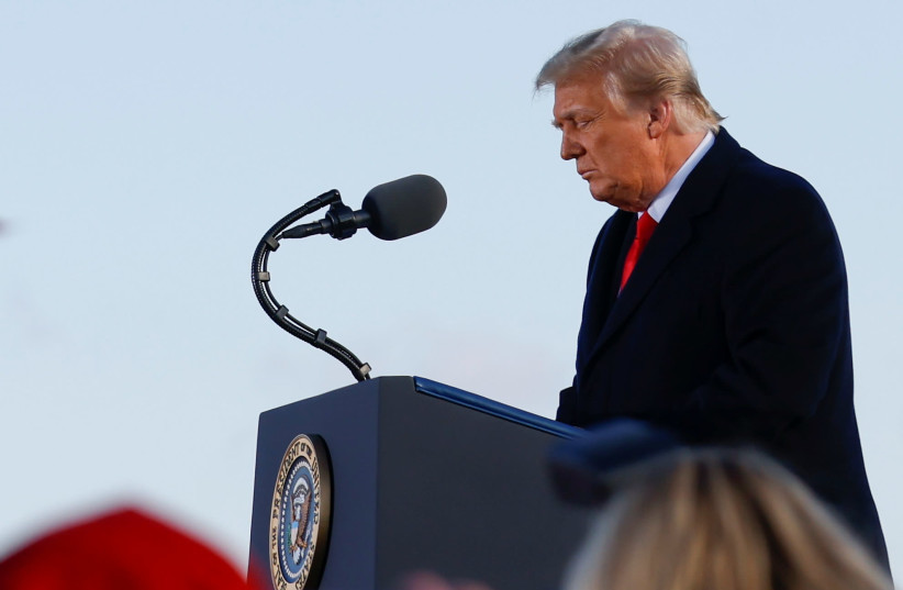 US President Donald Trump speaks at the Joint Base Andrews, Maryland, US, January 20, 2021. (photo credit: CARLOS BARRIA / REUTERS)