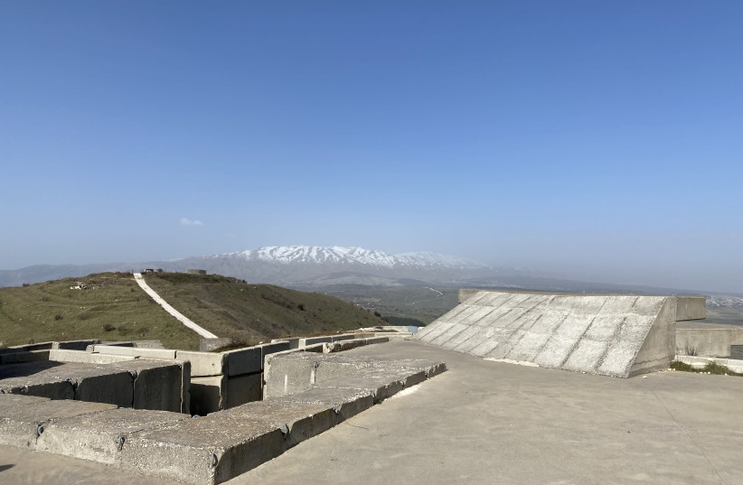 An old military fort on the Syrian border is seen, with snow-covered Mount Hermon in the background. (photo credit: SETH J. FRANTZMAN)