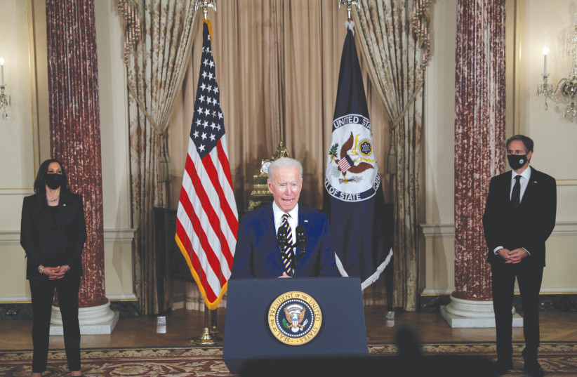 US PRESIDENT Joe Biden speaks at the State Department in Washington last week as Vice President Kamala Harris and Secretary of State Antony Blinken listen.  (photo credit: TOM BRENNER/REUTERS)