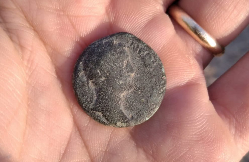 Coin obverse with head of the Roman emperor Antoninus Pius (photo credit: NIR DISTELFELD/ ISRAEL ANTIQUITIES AUTHORITY)