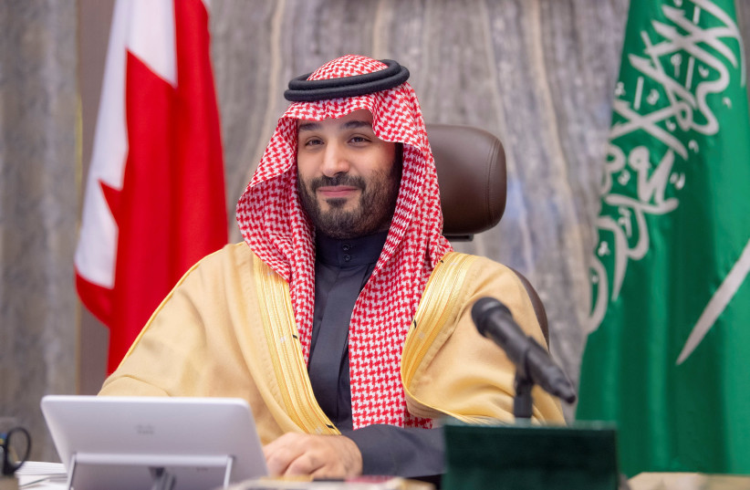 Saudi Crown Prince Mohammed bin Salman chairs first season of the Saudi-Bahraini Coordination Council, virtually with Bahrain's Prime Minister and Crown Prince Salman bin Hamad al-Khalifa, in Riyadh, Saudi Arabia (photo credit: BANDAR ALGALOUD / SAUDI ROYAL COURT / REUTERS)