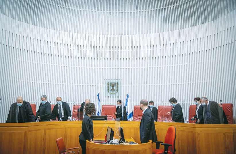 SUPREME COURT justices arrive for a hearing at the Supreme Court in Jerusalem last month.  (photo credit: YONATAN SINDEL/FLASH 90)