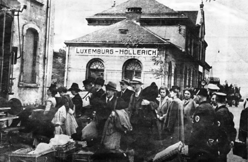DEPORTATION OF Jews from Hollerich, Luxembourg, by local police, 1942 (credit: EUROJEWCONG)