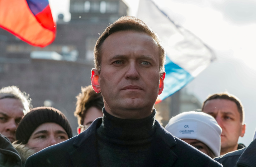 Russian opposition politician Alexei Navalny takes part in a rally in Moscow, Russia, February 29, 2020.  (photo credit: REUTERS/SHAMIL ZHUMATOV/FILE PHOTO)
