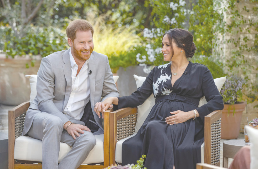 PRINCE HARRY and Meghan, the Duchess of Sussex, during their interview with Oprah Winfrey. (credit: HARPO PRODUCTIONS/JOE PUGLIESE/HANDOUT VIA REUTERS)