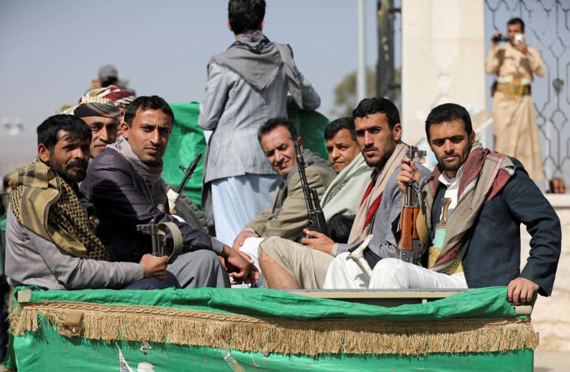 Armed Houthi followers participate in a funeral of Houthi fighters killed in fighting against government forces in Yemen's Marib, in Sanaa (credit: REUTERS/KHALED ABDULLAH)