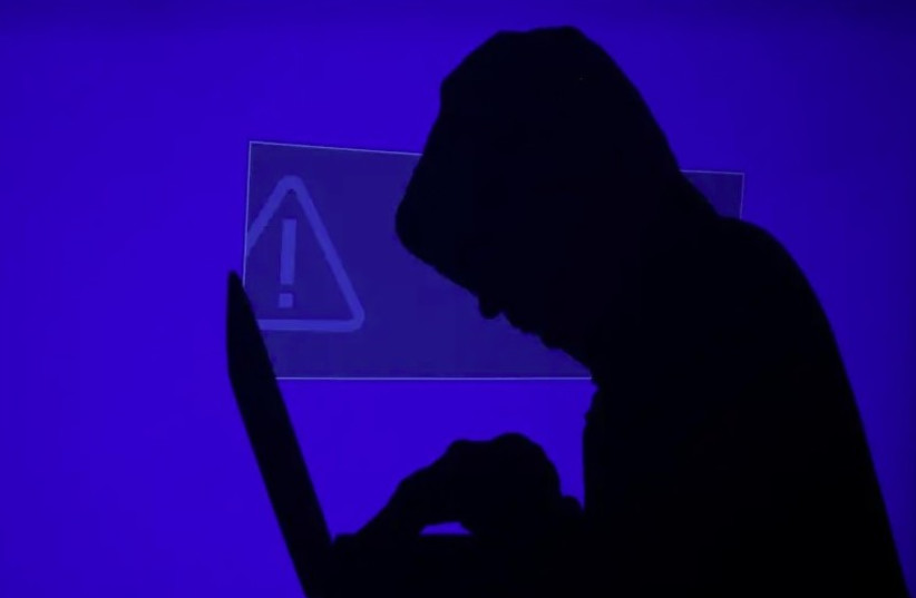 A hacker is being depicted in this illustrative photo  (photo credit: Courtesy)