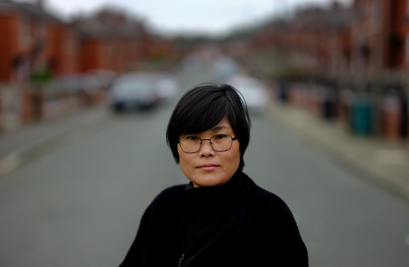 Jihyun Park, who fled North Korea before settling in Britain, poses for a photograph after deciding to stand for election as a Conservative party candidate in the upcoming local elections in the Moorside Ward in Bury, Britain, March 22, 2021. Picture taken March 22, 2021.  (photo credit: PHIL NOBLE/REUTERS)