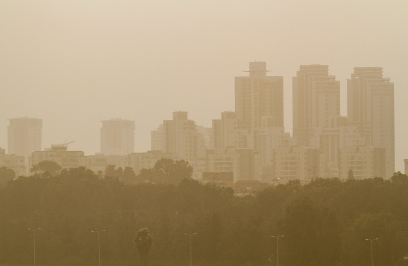 View of the Israeli city of Netanya on a hazy day, December 25, 2019.  (photo credit: FLASH90)