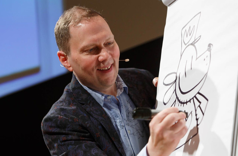 "Dog Man" series author Dav Pilkey gives a presentation to local students, October 11, 2019. (photo credit: SHAWN MILLER/LIBRARY OF CONGRESS)