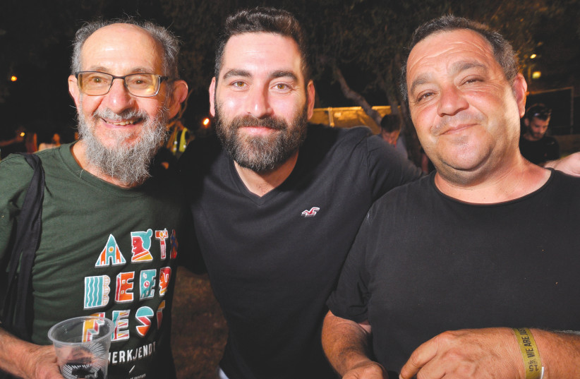 (FROM LEFT) The writer with Maor Helfman of Herzl Brewery, and Rotem Bar-Ilan of HaDubim Brewery (photo credit: MIKE HORTON)