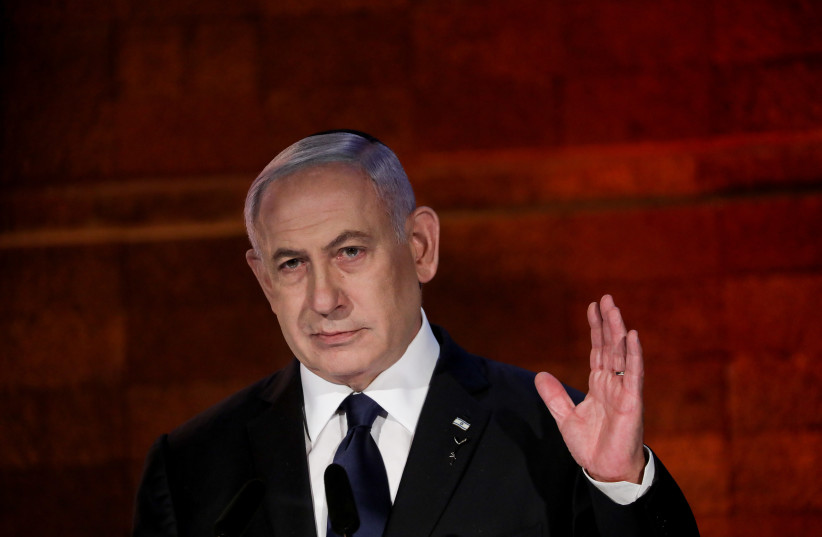 Prime Minister Benjamin Netanyahu at Yad Vashem's Holocaust Remembrance Day ceremony, April 7, 2021.  (photo credit: OLIVIER FITOUSSI/FLASH90)