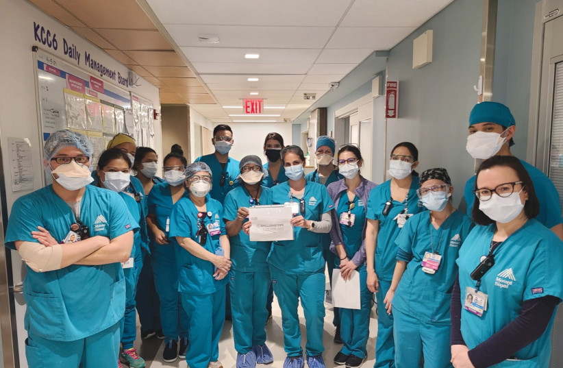 DOCTORS, NURSES and support staff at Mount Sinai Hospital in New York who participated in the six million steps campaign. (photo credit: IAC)