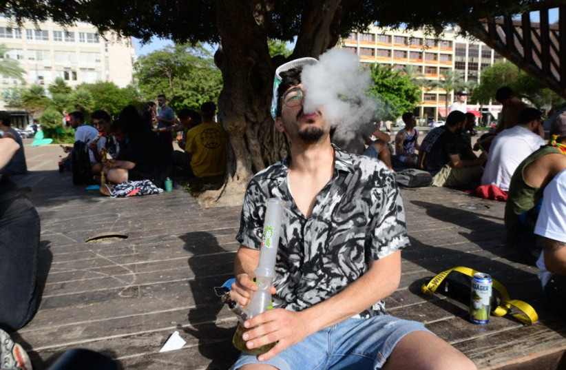 Hundreds of Israelis gather in Rabin Square in Tel Aviv on April 20, 2021to protest in favor of cannabis legalization and for reforms in the medical cannabis market. (credit: AVSHALOM SASSONI/ MAARIV)