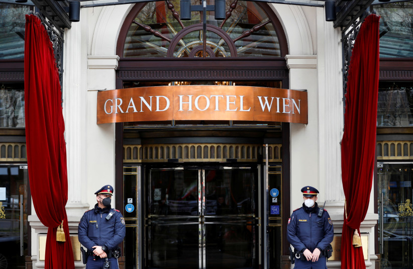 Police stand outside a hotel where a meeting of the Joint Commission of the Joint Comprehensive Plan of Action (JCPOA), or Iran nuclear deal, is held in Vienna, Austria, April 20, 2021. (credit: REUTERS/LEONHARD FOEGER)