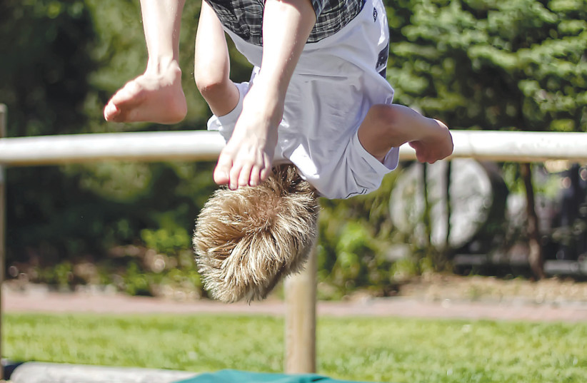 GET KEEN on a trampoline. (credit: FLAVIUS LES AND MARTIN MAGNEMYR/UNSPLASH)