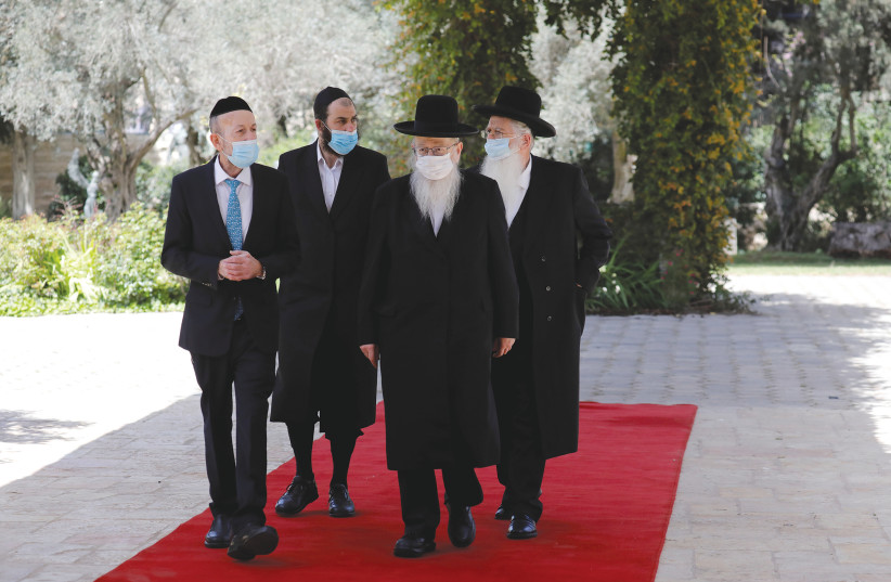 UNITED TORAH JUDAISM Party members, inlcuidng Uri Maklev (left) and Ya’acov Litzman (second from right), arrive at the President’s Residence on April 5. (credit: AMIR COHEN/REUTERS)