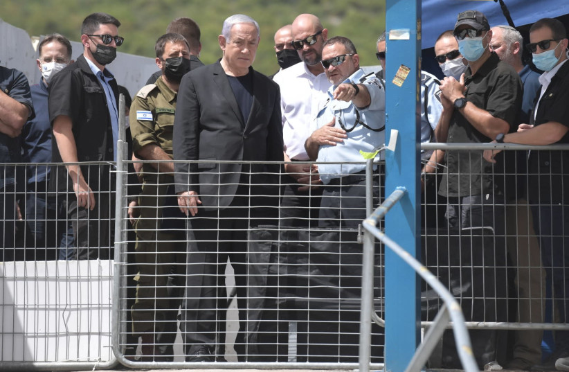 Prime Minister Benjamin Netanyahu at Mount Meron after the tragic incidents on Thursday night, April 30, 2021 . (credit: KOBI GIDEON/GPO)