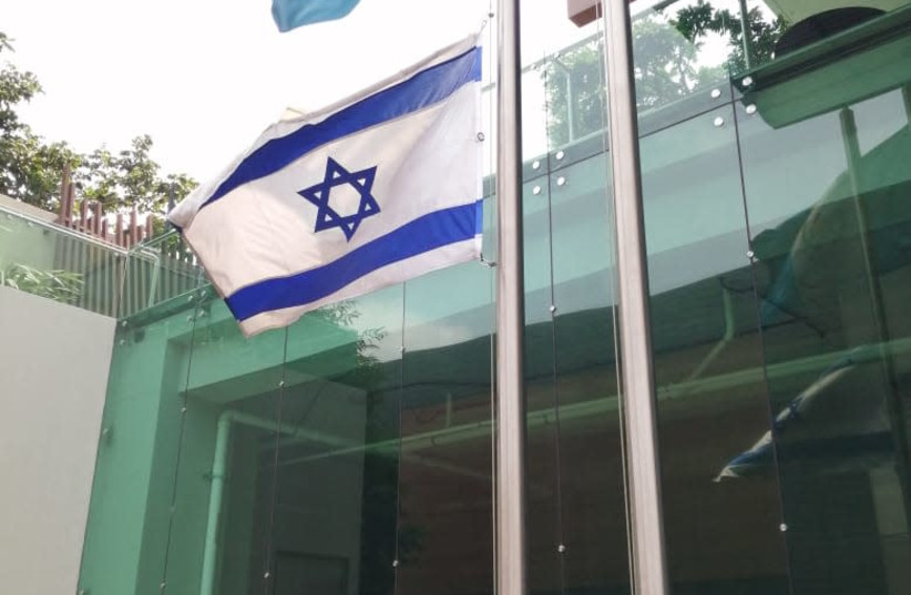 The Israeli Embassy in Guatemala places its flag at half-mast to commemorate the victims of the Meron stampede that took place on Lag Ba'omer 2021. (credit: FOREIGN MINISTRY)