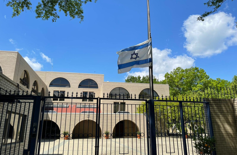 The Israeli Embassy in Washington, DC places its flag at half-mast to commemorate the victims of the Meron stampede that took place on Lag Ba'omer 2021. (photo credit: FOREIGN MINISTRY)