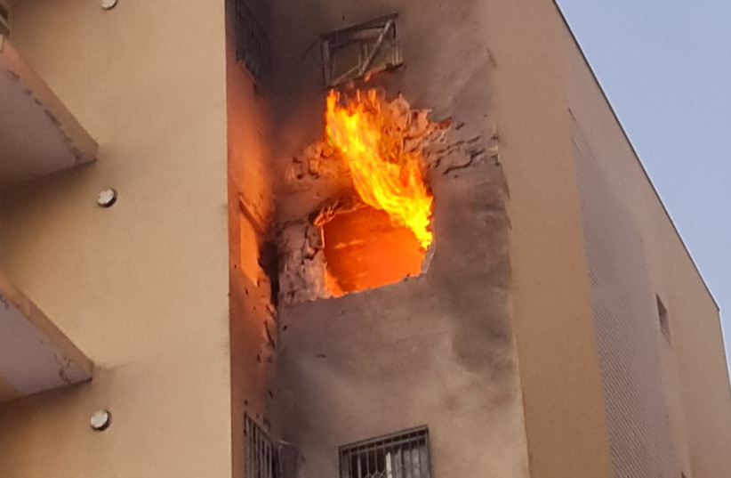 Building hit by rocket fire, Sderot, May 12, 2021 (photo credit: SDEROT MUNICIPALITY)