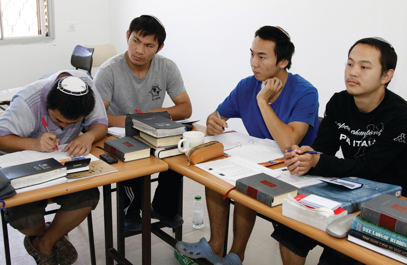 Young Chinese men study in Gush Etzion, preparing for their Orthodox conversion (credit: GERSHON ELINSON/FLASH90)