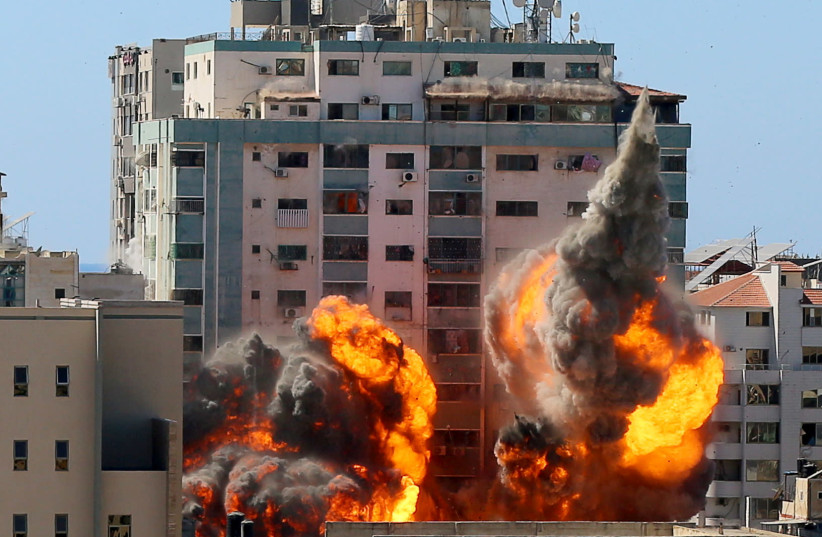An explosion. (photo credit: ASHRAF ABU AMRAH / REUTERS)