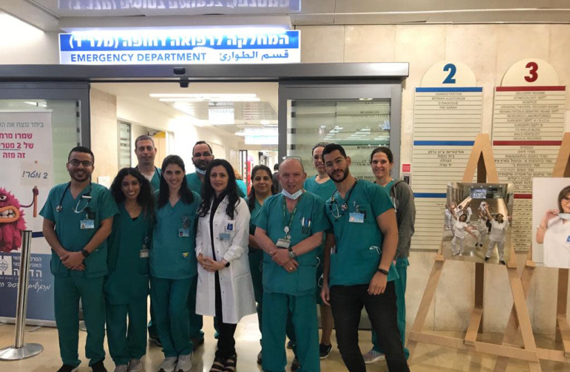 Hadassah-University Medical Center in Jerusalem's Mount Scopus Emergency Medicine Department with her Jewish and Arab staff. (credit: ROSSELLA TERCATIN)