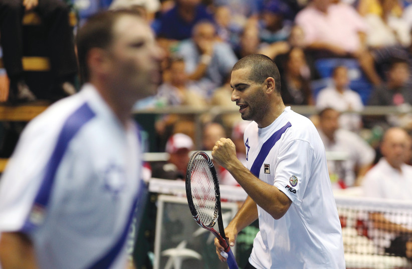 ANDY RAM (right) and Jonathan Erlich of Israel react as they win a point during their Davis Cup’s doubles playoff tennis match in Tel Aviv in 2010. (credit: NIR ELIAS / REUTERS)