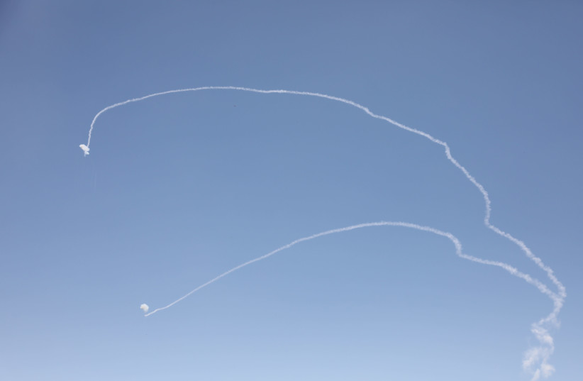 Iron dome anti-missile system fires interception missiles as rockets fired from the Gaza Strip to Israel, in the southern Israeli city of Ashkelon, May 19, 2021 (credit: OLIVIER FITOUSSI/FLASH90)