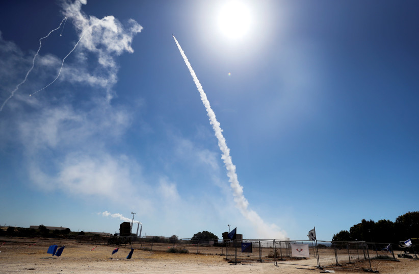 Israel's Iron Dome anti-missile system fires to intercept a rocket launched from the Gaza Strip towards Israel, as seen from Ashkelon, southern Israel May 19, 2021. (credit: AMMAR AWAD/REUTERS)