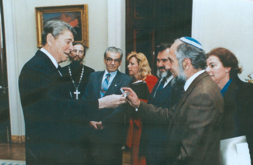 President Ronald Reagan with Yosef Begun (right) (credit: Courtesy)