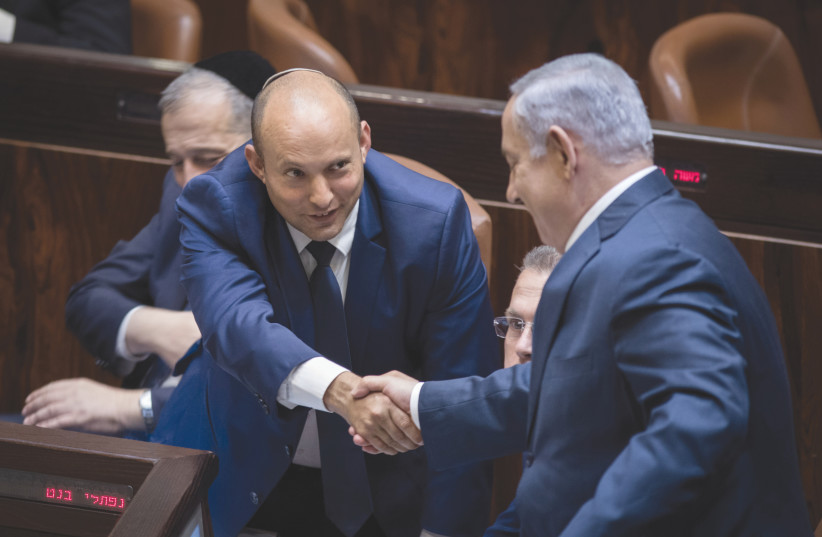 PRIME MINISTER Benjamin Netanyahu and then-education minister Naftali Bennett in the Knesset in 2017. (credit: HADAS PARUSH/FLASH90)