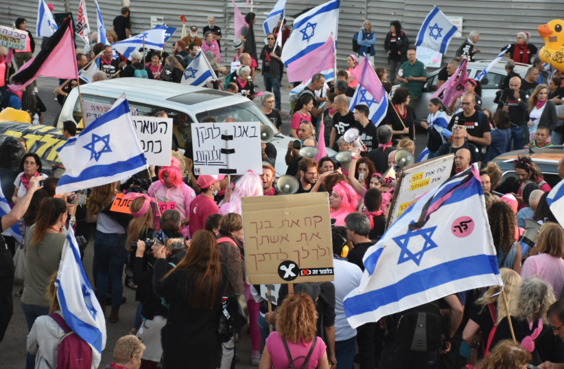 PROTESTERS GATHER in front of the Knesset before marching to Balfour and the Prime Minister's Residence in a protest they are calling 'yes to a unity government! No to incitement and violence!' June 5, 2021. (photo credit: YAIR FELTI)