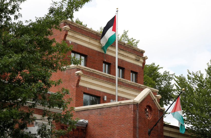 Flags fly over the Palestine Liberation Organization (PLO) office, Washington DC, September 12, 2018 (photo credit: REUTERS/KEVIN LAMARQUE)