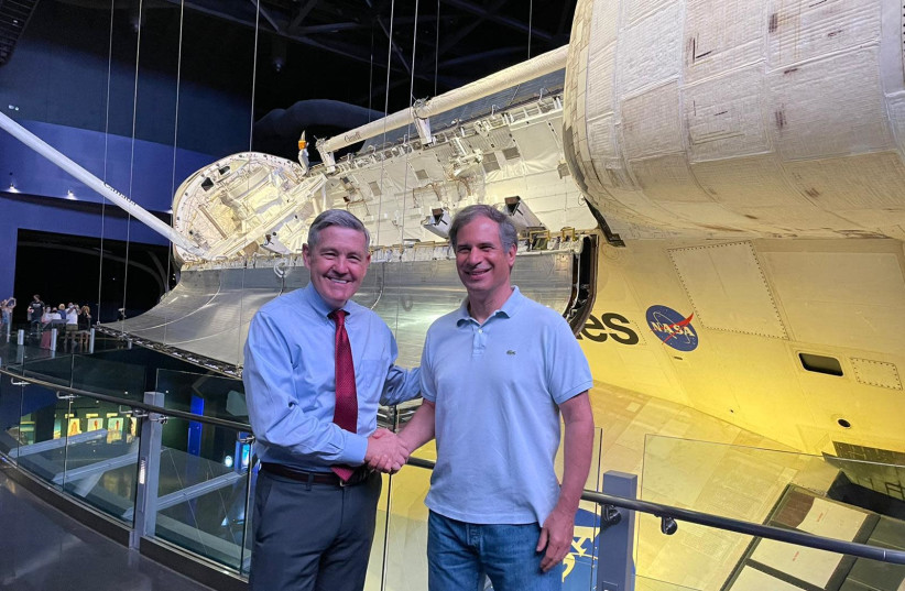 Eytan Stibbe shakes hands with Bob Cabana, director of NASA’s John F. Kennedy Space Center and a former astronaut (photo credit: PR)