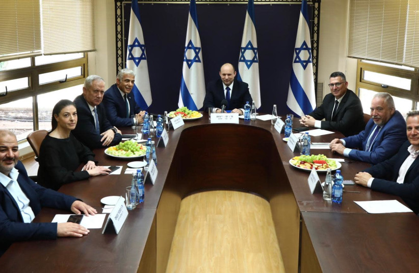 The eight party leaders of the 36th government coalition meet before the swearing in, June 13, 2021 (photo credit: ARIEL ZANDBERG)