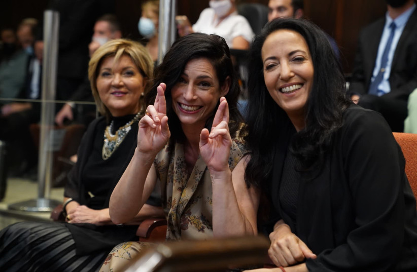 FROM LEFT: Nurit Levy, wife of Mickey Levy, Gilat Bennett, wife of Naftali Bennett, and Lihi Lapid, wife of Yair Lapid. (credit: DANI SHEM TOV/KNESSET SPOKESPERSONS OFFICE)