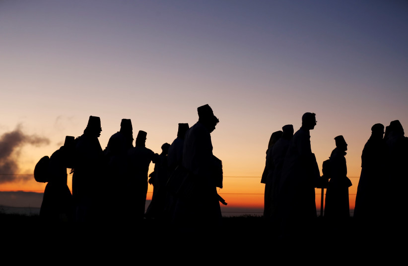 Members of the Samaritan sect take part in a traditional pilgrimage marking the holiday of Shavuot, atop Mount Gerizim (photo credit: MOHAMAD TOROKMAN/REUTERS)