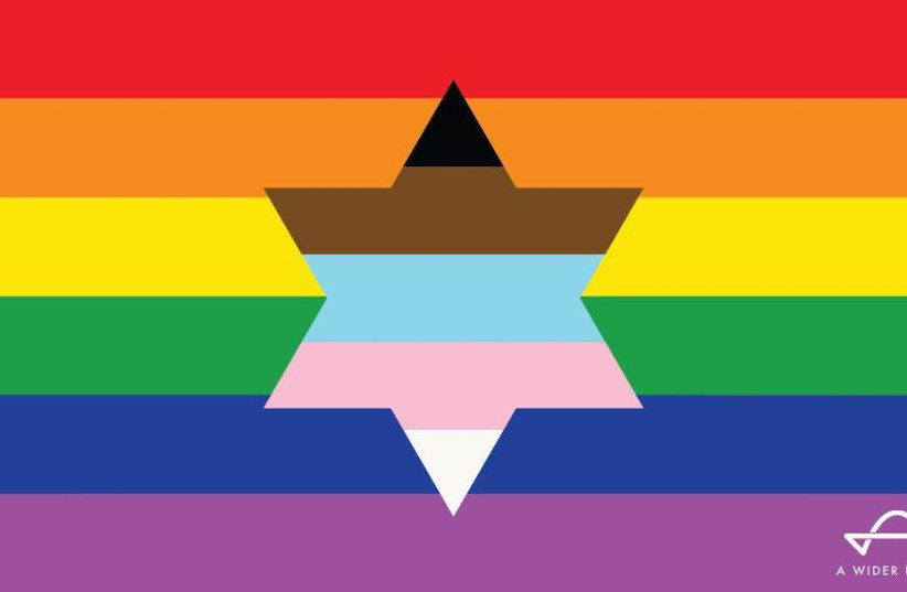 A Wider Bridge created a new inclusive flag whose rainbow colors and Star of David represent inseparable parts of the identities of LGBTQ Jews.  (photo credit: A WIDER BRIDGE VIA JTA)