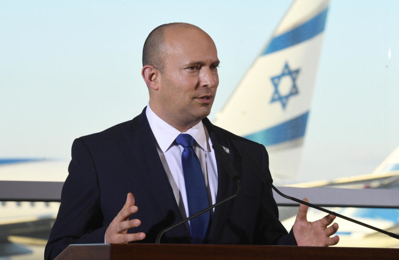 Prime Minister Naftali Bennett speaks at Ben-Gurion Airport on Coronavirus developments, June 22. (photo credit: HAIM TZACH)