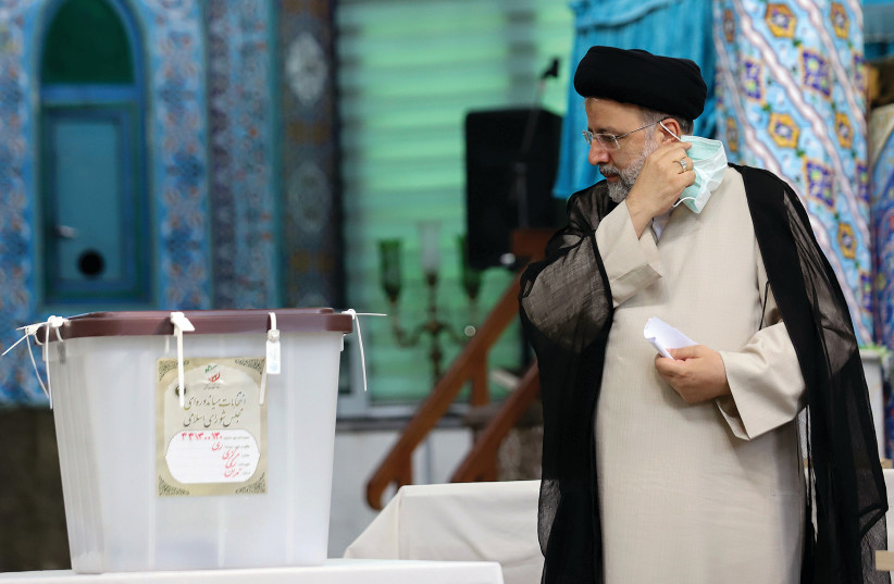 EBRAHIM RAISI arrives at a polling station in Tehran to cast his vote in last week’s presidential election, which he won. (credit: MAJID ASGARIPOUR/WANA (WEST ASIA NEWS AGENCY) VIA REUTERS)